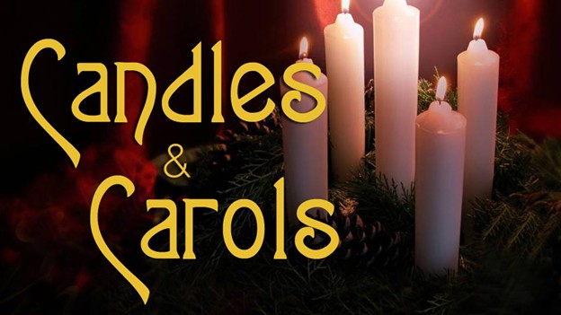 Lit white candles arranged in greenery with pinecones, with the words Candles & Carols overlaid in decorative gold text.